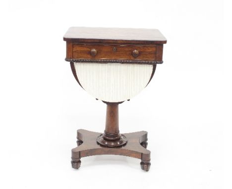 An early 19th Century rosewood work table with frieze drawer and reel moulded wool basket on turned column and tripod base, 5