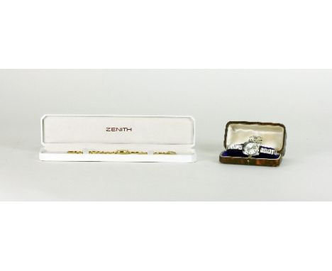 A lady's 9ct gold cased wristwatch, the oblong dial signed Zenith, the case numbered 63 2680 061 on a 9ct gold square-link br