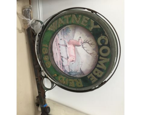 A light-up Watney Comb Reid pub sign