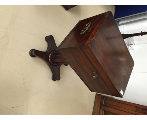 A William 1V mahogany wine cooler on quadruple base