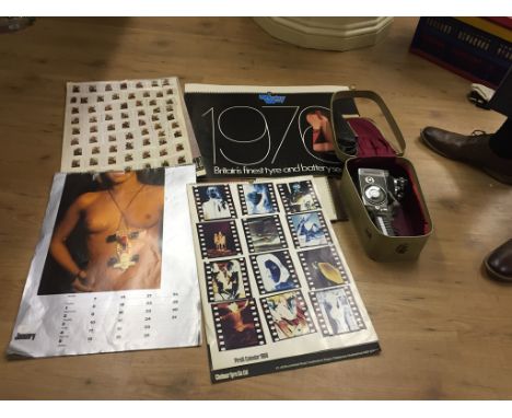 Seven Pirelli vintage calendars; together with a Yashica 8-E1 handheld cine camera and tripod