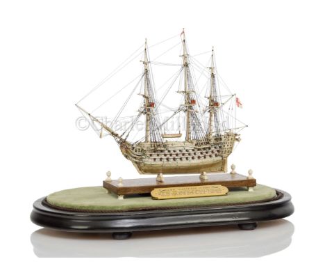 A NAPOLEONIC FRENCH PRISONER-OF-WAR BONE MODEL FOR THE 74-GUN 3RD RATE ILLUSTRIOUS, CIRCA 1810 the 5½in. planked and pinned h