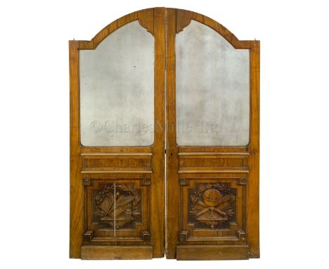 A PAIR OF BREAK ARCH SALOON DOORS, PROBABLY FROM A PRIVATE STEAM YACHT, CIRCA 1890 constructed in oak, with shaped mirror top