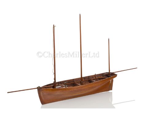 AN HISTORICALLY INTERESTING MODEL OF THE RAMSGATE HOVELLERS' LUGGER PRINCE OF WALES , BUILT BY H. TWYMAN AND DISPLAYED AT THE