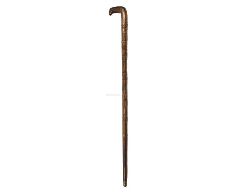 A RELIEF-CARVED WALKING STICK, CIRCA 1840 carved overall and possibly depicting a sequence of Alexander Selkirk ("Robinson Cr