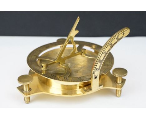 Brass compass and sundial with three levelling posts