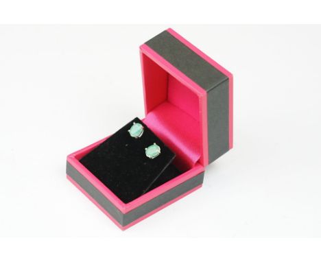 Pair of silver and enamel stud earrings, cased
