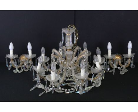 20th Century Murano glass ceiling chandelier having eight curved branches with faux candle sconces, with faceted glass drople