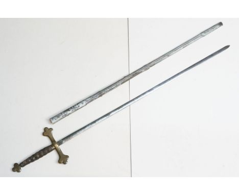 An early to mid 20th century court sword, brass finial and cross guard with leather grip and scabbard.