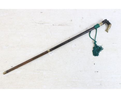 20th century walking stick cane with brass handle modelled as a mermaid, finished with a green cord tassel decoration H 93cm