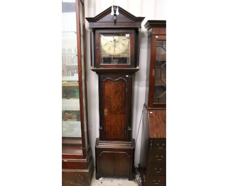 19th Century oak longcase clock case with Thomas Whipp of Rochdale clock movement having a brass roman numeral face with fret