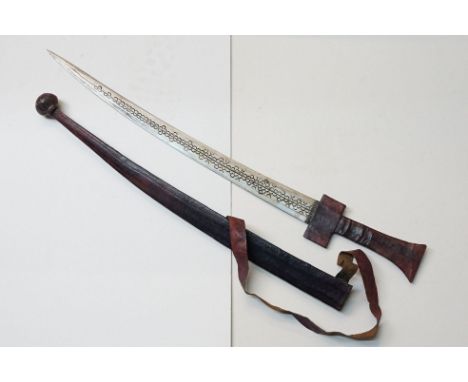 A Nigerian Takouba / Tuarag sword complete with scabbard and knife.