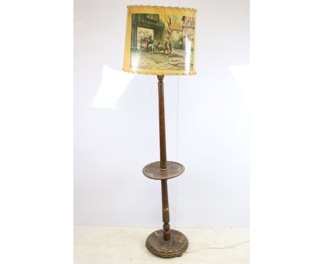 20th century turned mahogany floor standing lamp with circular centre shelf and hand painted decoration together with a large