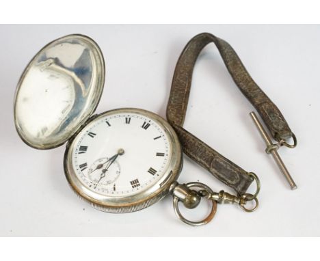 A fully hallmarked sterling silver full hunter pocket watch, white enamel dial with sub second hand to 6 o'clock, mounted to 