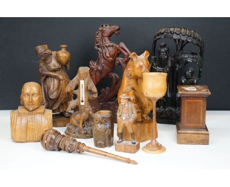 Various carved wooden sculptures and items to include horse, bear thermometer, woman with jug, bear on stand, primitive whisk