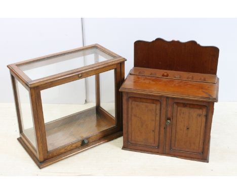 20th century mahogany smoker's chest with six pipe rests to top and double doors to three drawer interior, H 47cm, W 41cm, D 