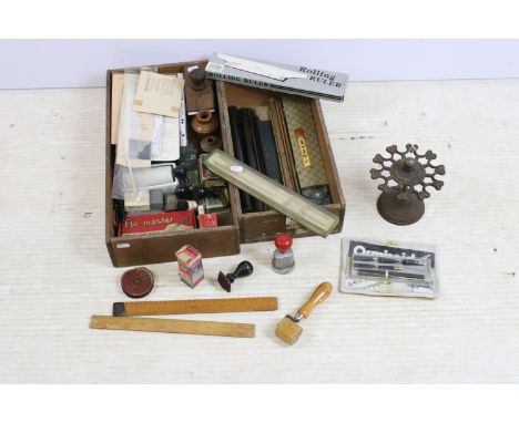 Quantity of vintage writing and measuring equipment to include an assortment of rulers, carousel holder, blotter stamps, foun