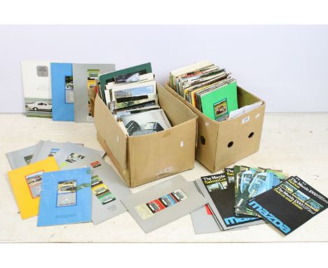 A large collection of over 230 x 1970's and 1980's car brochures to include Ferrari, Mercedes, Ford, Nissan, Rover, Austin Mo