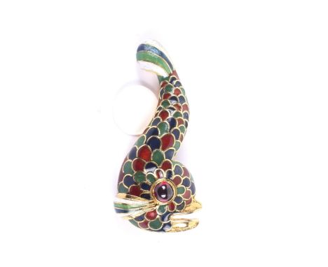 A vintage garnet and enamel brooch in the form of a stylised dolphin or fish after the Holbeinesque antique. With a cabochon 