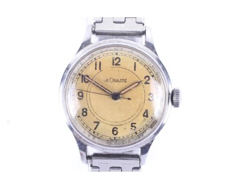 Le Coultre, a gentleman's stainless steel round wrist watch, cica 1940. The cream dial with black painted Arabic numerals, lu
