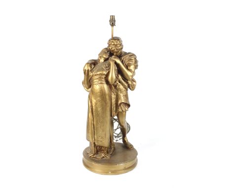 A mid-late 20th century gilt painted plaster electric lamp in the classical manner of figures. Total H79cm 