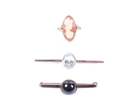 Two vintage gold and gem set bar brooches and a cameo ring. Comprising; a vintage gold and oval aquamarine single stone bar b