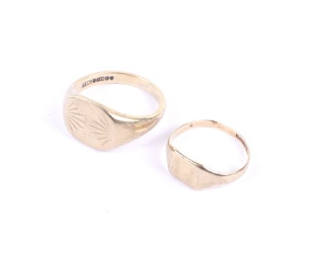 Two vintage 9ct gold signet rings. Comprising; an oblong signet ring with fan shaped decoration between tapering shoulders on