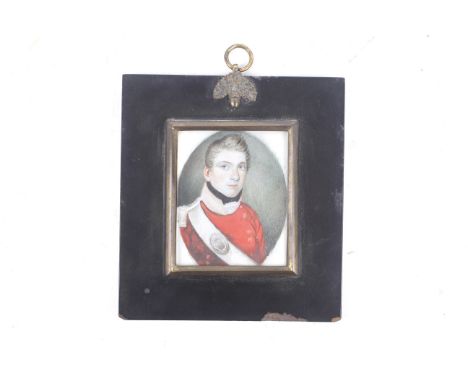 An ivory miniature portrait in an ebonized wooden frame, with bras sborder and acorn hanging ring. An officer of 37th North H