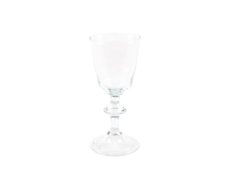 An 18th century wine glass. With angular knop to the stem over a folded foot. H16.5cm   Condition Report:  lighter than you w