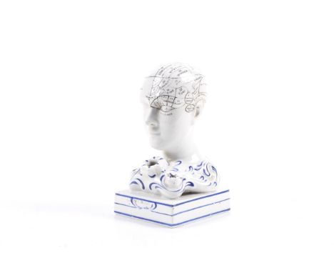 A small ceramic phenology head. 'By F. Bridger'.Porcelain with a glazed finish H14cm.