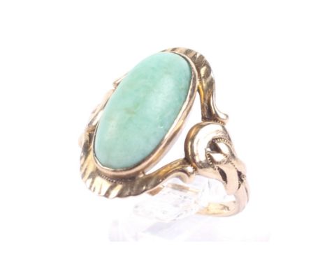 A vintage gold and aventurine quartz single stone ring. The oval cabochon rub-over set within an open surround and a part-tex