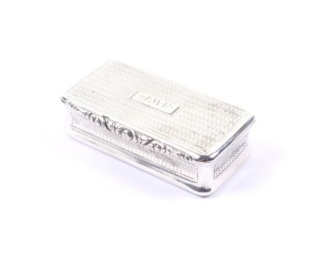 A George IV silver oblong engine turned snuff box. With concave sides, the hinged cover with a floral chased thumb-piece and 