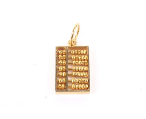 An Asian or middle-eastern high carat 'abacus' charm. Apparently unmarked, approx. 20.5mm high overall including the pendant 
