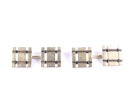 A pair of vintage gold and small sapphire square twin-panel cufflinks. With chain inter-links, stamped '14K', 16.2g; in an as