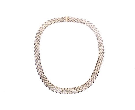 A vintage Italian 18ct gold block link collar/necklace. In the form of five rows of satinised and polished links, on a push s