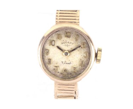 Rotary, a lady's 9ct gold cased round bracelet watch, circa 1967. The textured champagne dial with raised gilt Arabic numeral