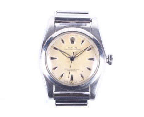 Rolex, Oyster Perpetual, a mid size stainless steel wristwatch, circa 1946-47. No.404966, The cream dial with raised arrow-he