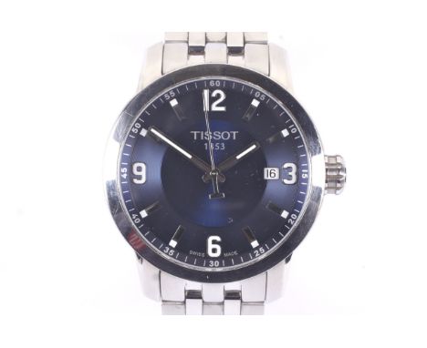 Tissot, a gentleman's stainless steel bracelet watch. The dark-blue 'guilloche' dial with baton indicators and Arabic quarter
