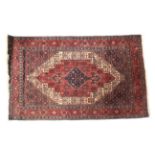 A red ground rug.