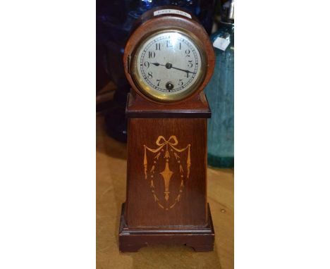 A French balloon mahogany cased mantle clock
