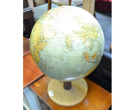 A vintage table top terrestrial globe