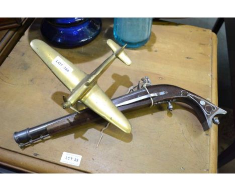 A brass desktop model of a Spitfire