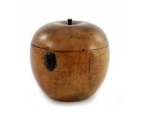 An early 19th Century turned fruitwood tea caddy ,in the form of an apple, circa 1800, simulated stalk and metal escutcheon, 
