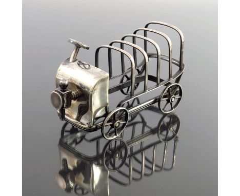 An Edwardian novelty silver plated automobile toast rack, Henry Wilkinson, circa 1905, modelled as a car, four division with 