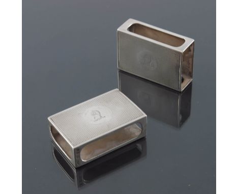 A pair of George V silver matchbox covers, GB&amp;S, London 1929, cuboid form with engine turned decoration (2)