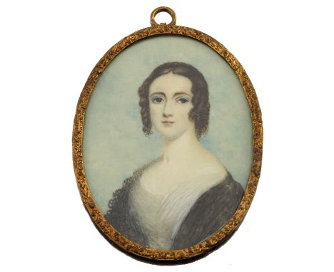 Friedrich Johann Gottlieb Lieder (German, 1780-1859), an early 19th century portrait miniature pendant, depicting a lady with