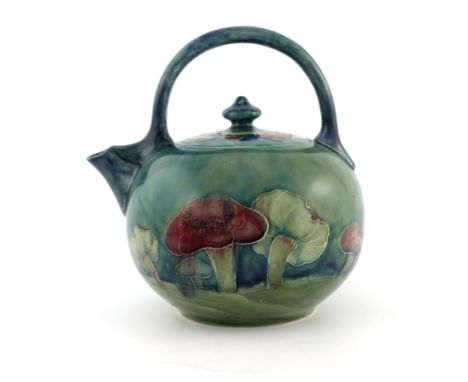 William Moorcroft, a Claremont teapot, globular loop handle form, circa 1905, printed Rd.No.420081, underglaze green signatur