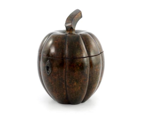 A late 18th Century European turned treen tea caddy, in the form of a lobed gourd/squash, simulated stalk and metal escutcheo