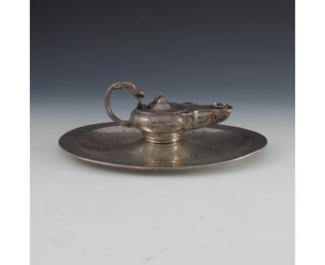 A Victorian silver table lighter, George John Richards, London 1856, the Classical oil lamp with zoomorphic handle and etched