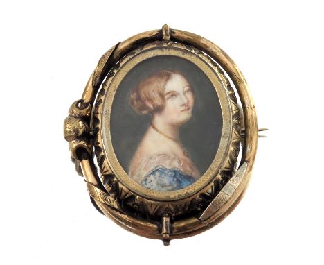 A 19th century yellow metal, portrait miniature swivel pendant, painted to depict a lady in blue and white dress, length 6cm,